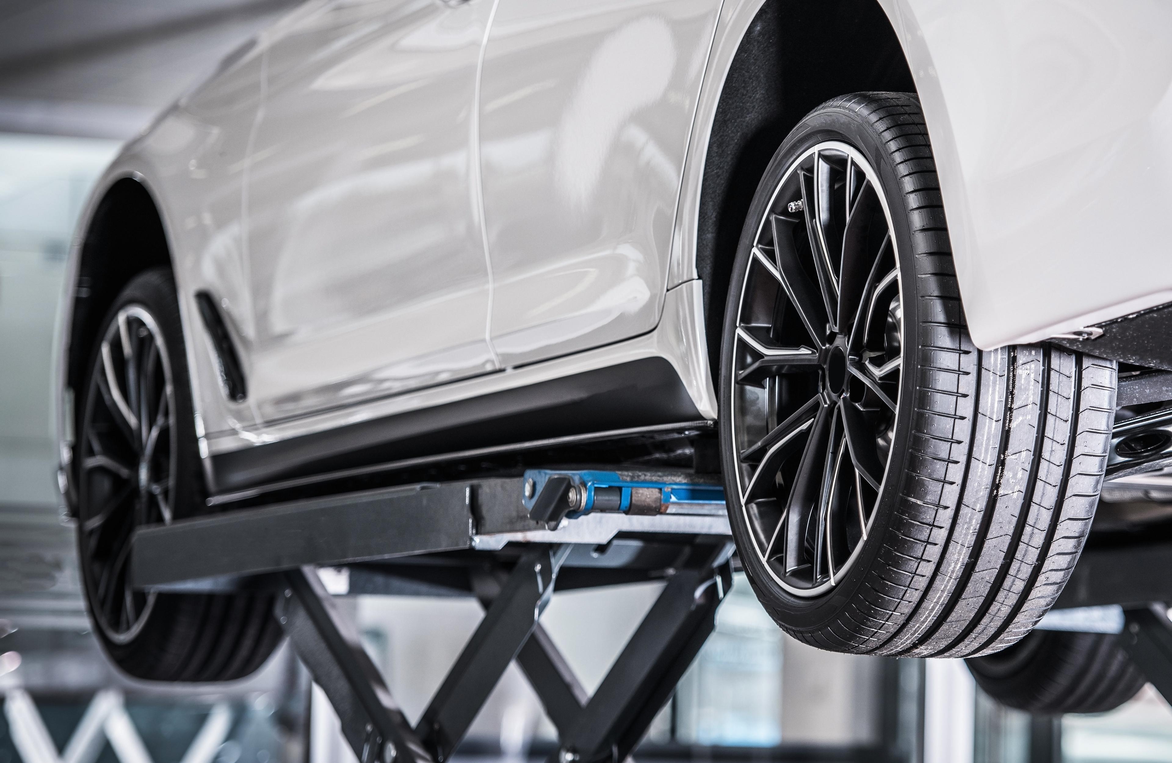 Car repair on a lift