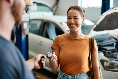 Customer receiving car keys