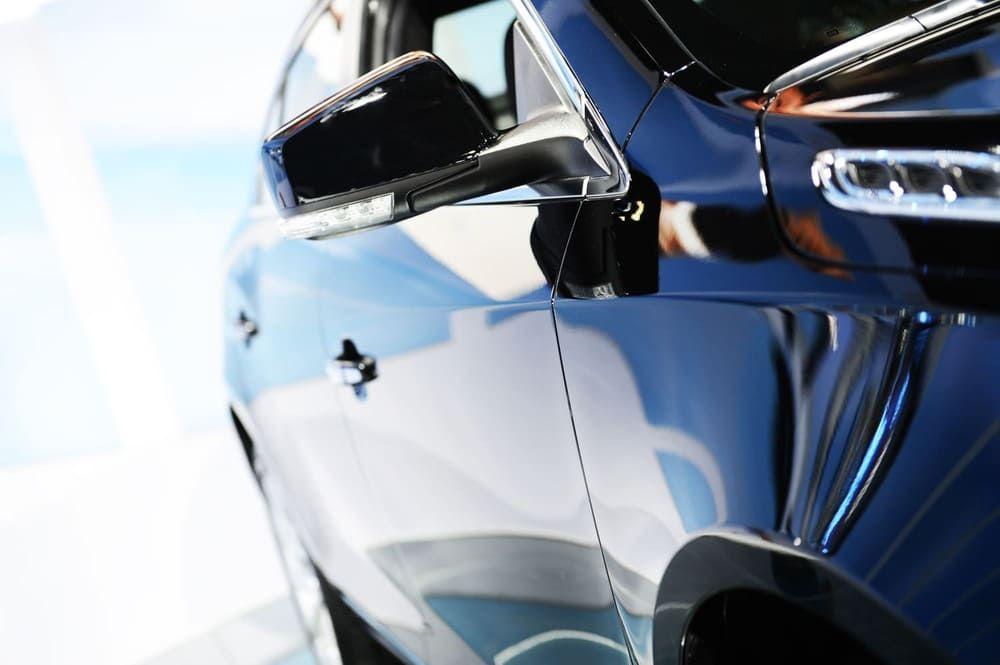 Close up of a shiny blue car