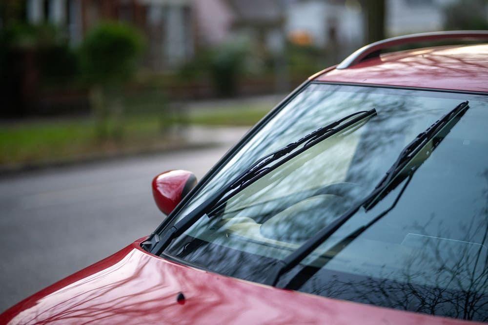 Red car parked on the street
