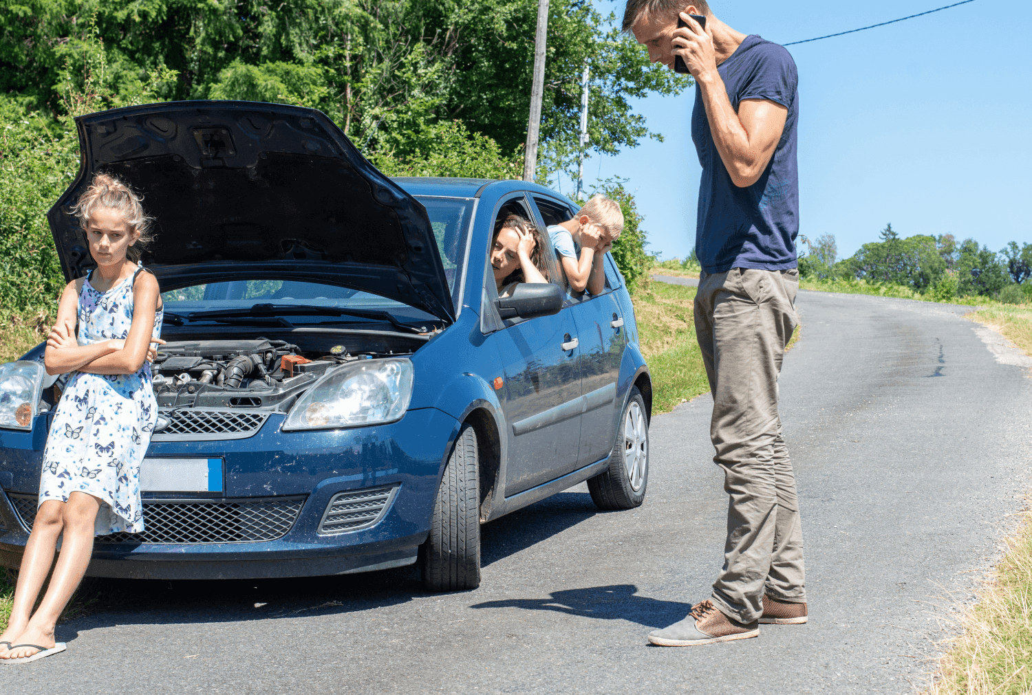 Family with broken down car