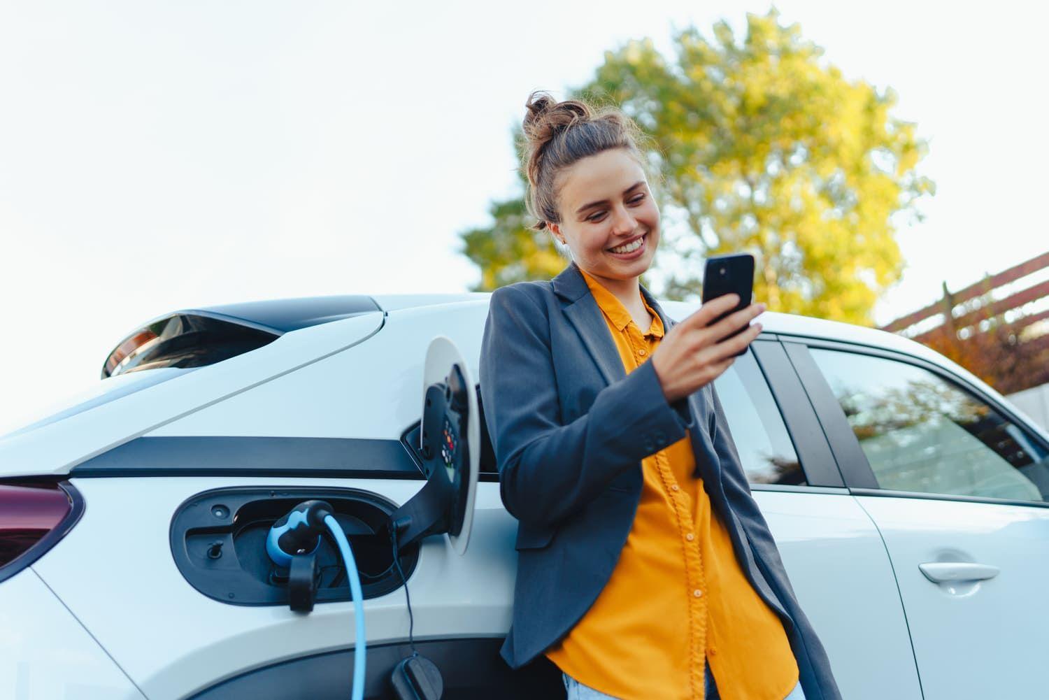 Driver checking the tax on an electric vehicle