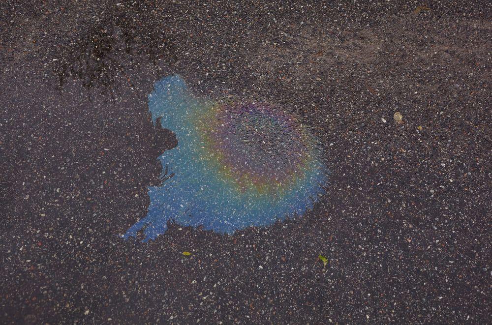 Fuel that has leaked onto the road
