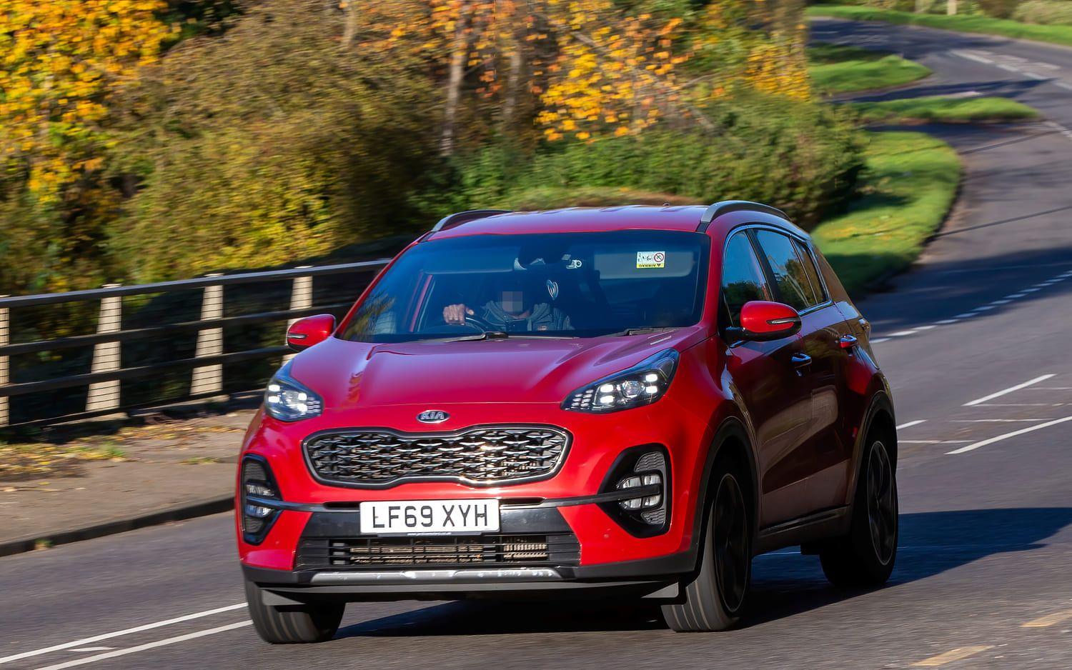 Multiple cars in parked in a repair centre